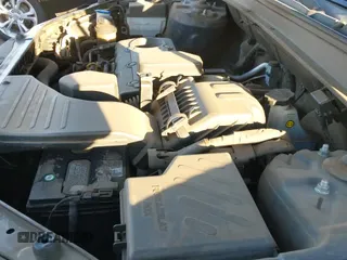 2012 Hyundai Santa Fe GLS z VIN 5XYZGDAB0CG096351, wystawiony jako IAAI lot #43476849 z przebiegiem 96 793 mil mil oraz . Historia ofert i sprzedaży dostępna na DreamBid. Obrazek 19.