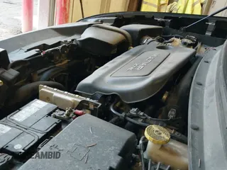 ✅ 2014 Jeep Cherokee Trailhawk • VIN: 1C4PJMBB1EW104938 • Lot: 43736578. Wystawiony na IAAI z przebiegiem 184 413 mil. Bezpłatny archiwum sprzedaży aukcyjnych z USA i szczegółowy raport historii pojazdu na DreamBid. Zdjęcie 18.