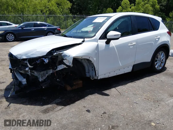 ✅ 2015 Mazda CX-5 Grand Touring • VIN: JM3KE4DY2F0536529 • Lot: 45116433. Listed on IAAI with 145,697 mi. Free auction sales archive from the USA and detailed vehicle history report at DreamBid. Image 2.