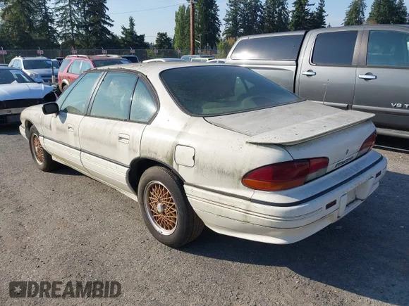 ✅ 1995 Pontiac Bonneville SE • VIN: 1G2HX52K7S4223887 • Лот: 43379962. Опубликован ранее на IAAI с пробегом 153 106 миль. Бесплатный доступ к архиву аукционных продаж из США и подробный отчёт об истории автомобиля на DreamBid. Изображение 3.