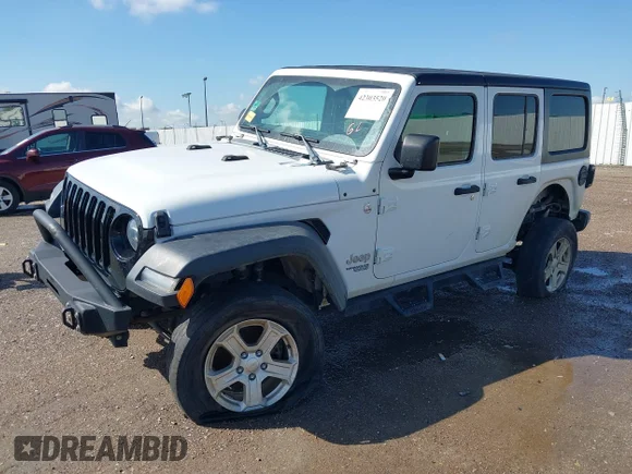 ✅ 2020 Jeep Wrangler Unlimited Sport • VIN: 1C4HJXDM2LW262867 • Lot: 42303520. Wystawiony na IAAI z przebiegiem 56 461 mil. Bezpłatny archiwum sprzedaży aukcyjnych z USA i szczegółowy raport historii pojazdu na DreamBid. Zdjęcie 2.