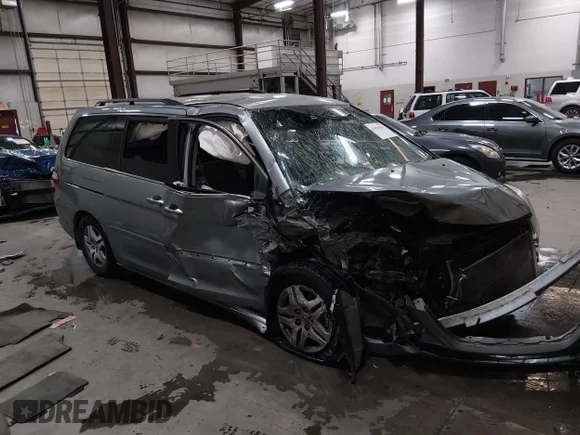 ✅ 2007 Honda Odyssey EX • VIN: 5FNRL38467B053269 • Lot: 45096333. Listed on IAAI with Not provided. Free auction sales archive from the USA and detailed vehicle history report at DreamBid. Image 1.