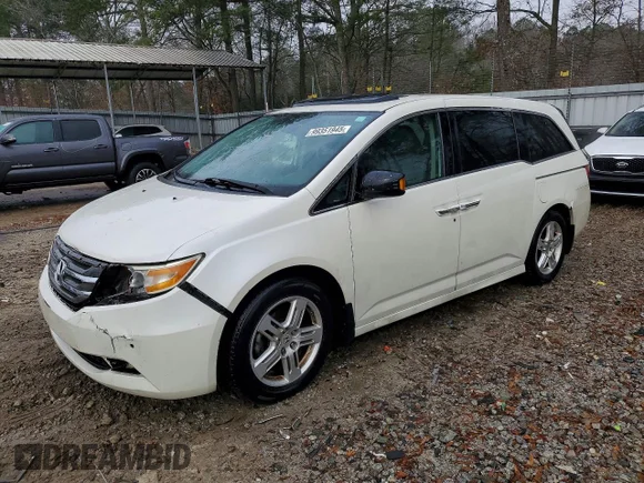 ✅ 2013 Honda Odyssey Touring • VIN: 5FNRL5H9XDB051690 • Lot: 99351945. Wystawiony na Copart z przebiegiem 149 550 mil. Bezpłatny archiwum sprzedaży aukcyjnych z USA i szczegółowy raport historii pojazdu na DreamBid. Zdjęcie 1.