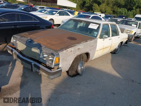 ✅ 1984 Buick LeSabre • VIN: 1G4AN69Y4EX437530 • Lot: 43167879. Wystawiony na IAAI z przebiegiem 78 708 mil. Bezpłatny archiwum sprzedaży aukcyjnych z USA i szczegółowy raport historii pojazdu na DreamBid. Zdjęcie 2.