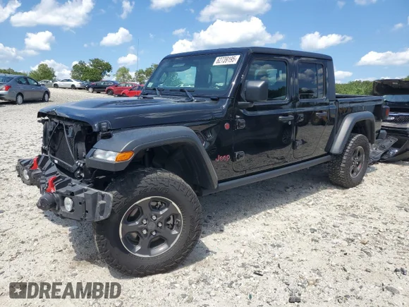 ✅ 2023 Jeep Gladiator Rubicon • VIN: 1C6JJTBG0PL575194 • Лот: 62739195. Опубліковано раніше на Copart з пробігом 40 500 миль. Безкоштовний доступ до архіву аукціонних продажів зі США та докладний звіт про історію автомобіля на DreamBid. Зображення 1.