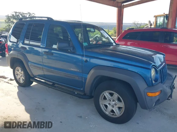 ✅ 2004 Jeep Liberty Sport • VIN: 1J4GL48KX4W240690 • Лот: 42302258. Опубліковано раніше на IAAI з пробігом 104 420 миль. Безкоштовний доступ до архіву аукціонних продажів зі США та докладний звіт про історію автомобіля на DreamBid. Зображення 1.