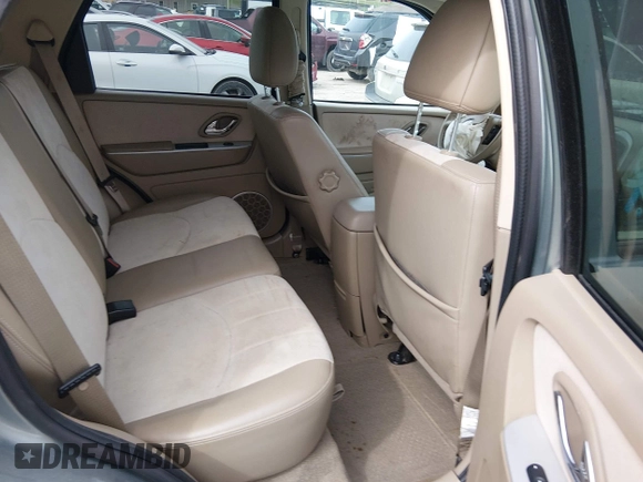 ✅ 2007 Mercury Mariner Premier • VIN: 4M2CU97147KJ06576 • Lot: 44560104. Wystawiony na IAAI z przebiegiem 127 283 mil. Bezpłatny archiwum sprzedaży aukcyjnych z USA i szczegółowy raport historii pojazdu na DreamBid. Zdjęcie 8.