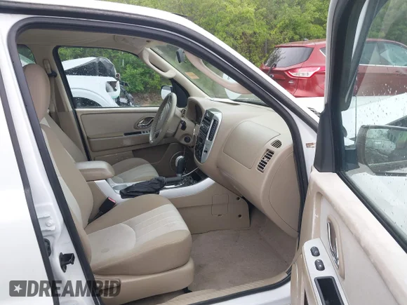 ✅ 2006 Mercury Mariner Convenience • VIN: 4M2YU56Z26DJ10859 • Lot: 45072773. Wystawiony na IAAI z przebiegiem 99 209 mil. Bezpłatny archiwum sprzedaży aukcyjnych z USA i szczegółowy raport historii pojazdu na DreamBid. Zdjęcie 5.