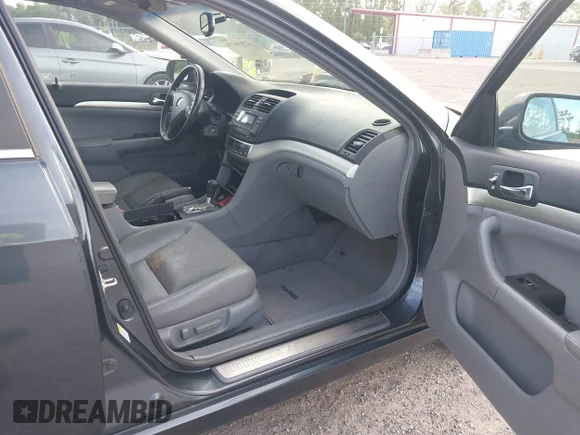 ✅ 2005 Acura TSX • VIN: JH4CL96825C003136 • Лот: 42569875. Опубликован ранее на IAAI с пробегом 205 752 миль. Бесплатный доступ к архиву аукционных продаж из США и подробный отчёт об истории автомобиля на DreamBid. Изображение 5.