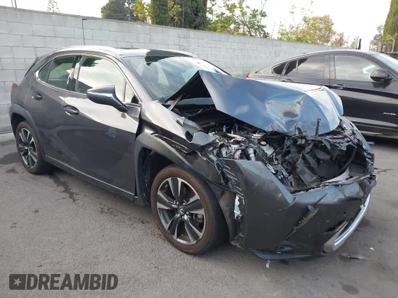 ✅ 2023 Lexus UX 250h • VIN: JTHX6JBH1P2153070 • Lot: 43642066. Wystawiony na IAAI z przebiegiem 72 100 mil. Bezpłatny archiwum sprzedaży aukcyjnych z USA i szczegółowy raport historii pojazdu na DreamBid. Zdjęcie 1.