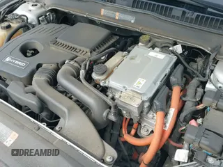 ✅ 2015 Ford Fusion S Hybrid • VIN: 3FA6P0UU8FR132666 • Lot: 42401286. Listed on IAAI with 71,418 mi. Free auction sales archive from the USA and detailed vehicle history report at DreamBid. Image 13.