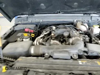 ✅ 2022 Jeep Gladiator Texas Trail • VIN: 1C6HJTAG7NL134613 • Лот: 70038155. Опубликован ранее на Copart с пробегом 52 438 миль. Бесплатный доступ к архиву аукционных продаж из США и подробный отчёт об истории автомобиля на DreamBid. Изображение 13.