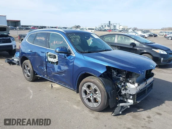 ✅ 2025 BMW X1 xDrive28i • VIN: WBX73EF01S5110817 • Лот: 41991160. Опубліковано раніше на IAAI з пробігом 1 287 миль. Безкоштовний доступ до архіву аукціонних продажів зі США та докладний звіт про історію автомобіля на DreamBid. Зображення 1.
