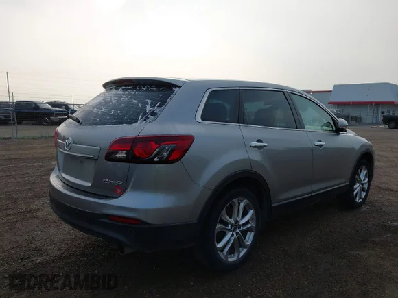 ✅ 2013 Mazda CX-9 Grand Touring • VIN: JM3TB2DA4D0409623 • Лот: 43822232. Опубліковано раніше на IAAI з пробігом 253 691 миль. Безкоштовний доступ до архіву аукціонних продажів зі США та докладний звіт про історію автомобіля на DreamBid. Зображення 4.