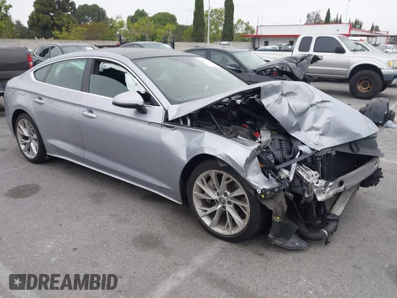 ✅ 2020 Audi A5 Sportback Premium • VIN: WAUANCF50LA008668 • Lot: 45015190. Listed on IAAI with 79,985 mi. Free auction sales archive from the USA and detailed vehicle history report at DreamBid. Image 1.