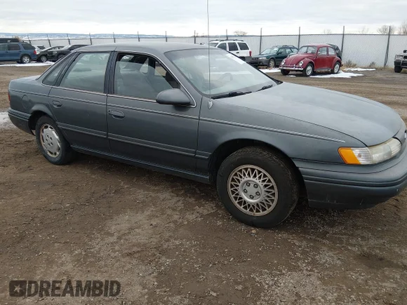 ✅ 1994 Ford Taurus GL • VIN: 1FALP52U3RG256343 • Lot: 43857201. Wystawiony na IAAI z przebiegiem 156 008 mil. Bezpłatny archiwum sprzedaży aukcyjnych z USA i szczegółowy raport historii pojazdu na DreamBid. Zdjęcie 1.