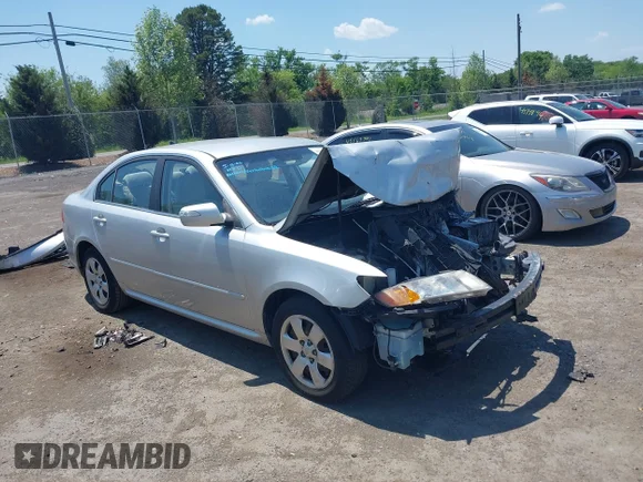 ✅ 2009 Kia Optima LX • VIN: KNAGE228695300640 • Лот: 45148009. Опубліковано раніше на IAAI з пробігом Не вказано. Безкоштовний доступ до архіву аукціонних продажів зі США та докладний звіт про історію автомобіля на DreamBid. Зображення 1.