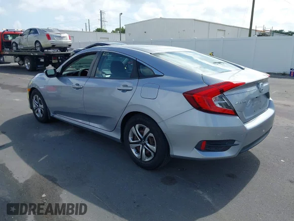 ✅ 2018 Honda Civic LX • VIN: 2HGFC2F54JH572929 • Лот: 45183194. Опубліковано раніше на IAAI з пробігом 64 307 миль. Безкоштовний доступ до архіву аукціонних продажів зі США та докладний звіт про історію автомобіля на DreamBid. Зображення 3.