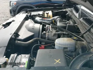 2004 Chevrolet Silverado 1500 z VIN 1GCEC14X84Z165693, wystawiony jako IAAI lot #42339398 z przebiegiem 175 863 mil mil oraz . Historia ofert i sprzedaży dostępna na DreamBid. Obrazek 12.