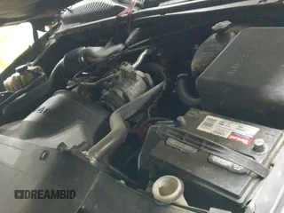 2004 Chevrolet Silverado 1500 Work Truck z VIN 1GCEC14X24Z263232, wystawiony jako IAAI lot #41720611 z przebiegiem 272 921 mil mil oraz . Historia ofert i sprzedaży dostępna na DreamBid. Obrazek 19.