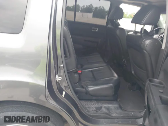 ✅ 2013 Honda Pilot Touring • VIN: 5FNYF3H94DB005182 • Лот: 45051270. Опубліковано раніше на IAAI з пробігом 203 145 миль. Безкоштовний доступ до архіву аукціонних продажів зі США та докладний звіт про історію автомобіля на DreamBid. Зображення 8.