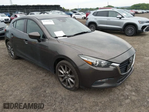 ✅ 2018 Mazda 3 Touring • VIN: 3MZBN1L37JM167845 • Лот: 45491566. Опубликован ранее на IAAI с пробегом Не указан. Бесплатный доступ к архиву аукционных продаж из США и подробный отчёт об истории автомобиля на DreamBid. Изображение 1.