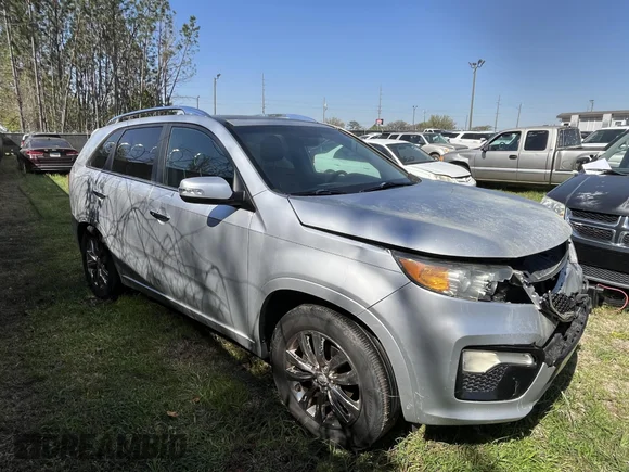 ✅ 2011 Kia Sorento SX • VIN: 5XYKW4A2XBG129620 • Lot: 44670040. Listed on IAAI with 192,126 mi. Free auction sales archive from the USA and detailed vehicle history report at DreamBid. Image 1.