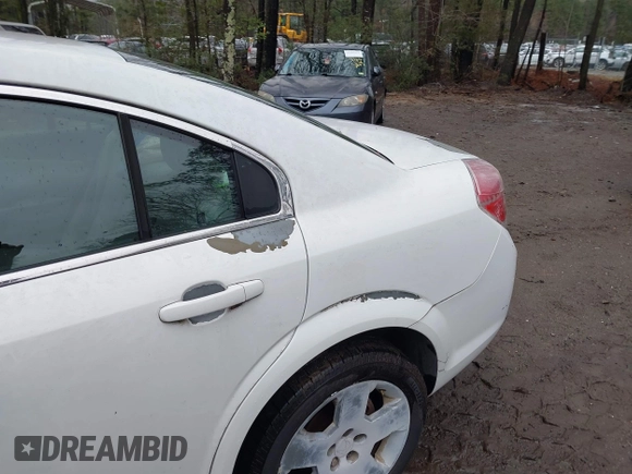 ✅ 2009 Saturn Aura XE • VIN: 1G8ZS57B19F196606 • Лот: 41796786. Опубліковано раніше на IAAI з пробігом 174 769 миль. Безкоштовний доступ до архіву аукціонних продажів зі США та докладний звіт про історію автомобіля на DreamBid. Зображення 6.