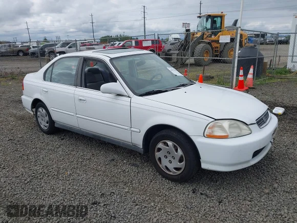 ✅ 1997 Honda Civic EX • VIN: 2HGEJ8649VH525039 • Лот: 44970780. Опубліковано раніше на IAAI з пробігом 161 607 миль. Безкоштовний доступ до архіву аукціонних продажів зі США та докладний звіт про історію автомобіля на DreamBid. Зображення 1.