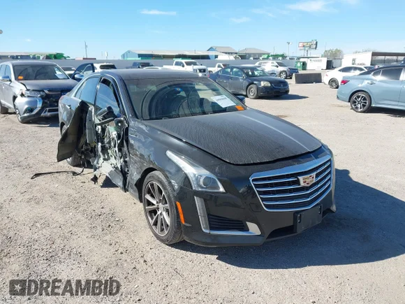 ✅ 2019 Cadillac CTS Luxury RWD • VIN: 1G6AR5SX1K0107873 • Лот: 44068688. Опубликован ранее на IAAI с пробегом 199 831 миль. Бесплатный доступ к архиву аукционных продаж из США и подробный отчёт об истории автомобиля на DreamBid. Изображение 1.