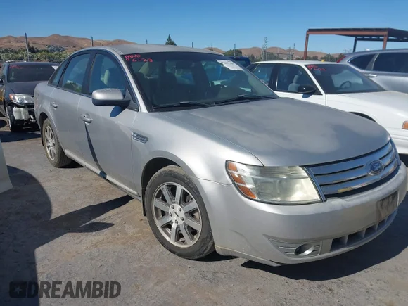 ✅ 2008 Ford Taurus SEL • VIN: 1FAHP24W48G142563 • Lot: 45437504. Listed on IAAI with 101,833 mi. Free auction sales archive from the USA and detailed vehicle history report at DreamBid. Image 1.