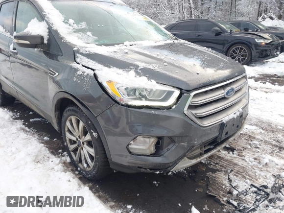 ✅ 2017 Ford Escape Titanium • VIN: 1FMCU9JD3HUE82227 • Lot: 44173846. Wystawiony na IAAI z przebiegiem 139 496 mil. Bezpłatny archiwum sprzedaży aukcyjnych z USA i szczegółowy raport historii pojazdu na DreamBid. Zdjęcie 6.