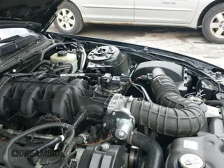 ✅ 2005 Ford Mustang Deluxe • VIN: 1ZVFT84N355204076 • Lot: 42395027. Wystawiony na IAAI z przebiegiem 45 732 mil. Bezpłatny archiwum sprzedaży aukcyjnych z USA i szczegółowy raport historii pojazdu na DreamBid. Zdjęcie 12.