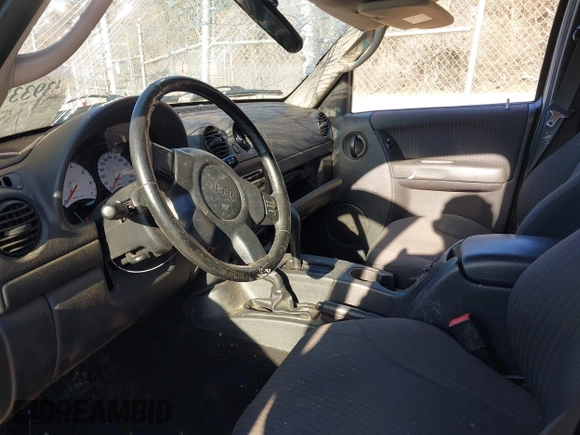 ✅ 2002 Jeep Liberty Sport • VIN: 1J4GL48K92W267635 • Lot: 43933757. Wystawiony na IAAI z przebiegiem 170 055 mil. Bezpłatny archiwum sprzedaży aukcyjnych z USA i szczegółowy raport historii pojazdu na DreamBid. Zdjęcie 5.