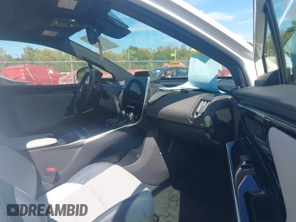 ✅ 2023 Subaru Solterra Premium • VIN: JTMABABA8PA012573 • Лот: 43324935. Опубликован ранее на IAAI с пробегом 13 386 миль. Бесплатный доступ к архиву аукционных продаж из США и подробный отчёт об истории автомобиля на DreamBid. Изображение 5.
