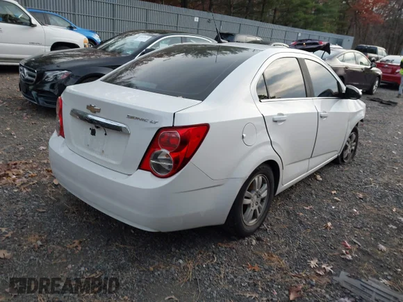 ✅ 2014 Chevrolet Sonic LT • VIN: 1G1JC5SH7E4159425 • Lot: 43605492. Listed on IAAI with 144,742 mi. Free auction sales archive from the USA and detailed vehicle history report at DreamBid. Image 4.