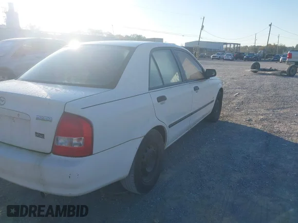 ✅ 2000 Mazda Protege DX • VIN: JM1BJ2225Y0209553 • Lot: 43466289. Wystawiony na IAAI z przebiegiem Nie podano. Bezpłatny archiwum sprzedaży aukcyjnych z USA i szczegółowy raport historii pojazdu na DreamBid. Zdjęcie 4.