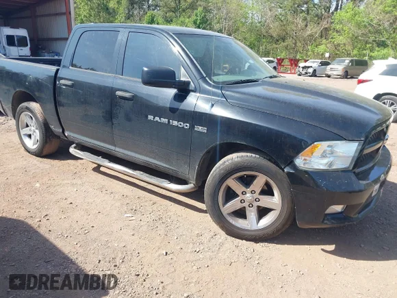 ✅ 2012 Ram 1500 Express • VIN: 1C6RD6KT3CS330267 • Lot: 44701179. Listed on IAAI with 267,245 mi. Free auction sales archive from the USA and detailed vehicle history report at DreamBid. Image 1.