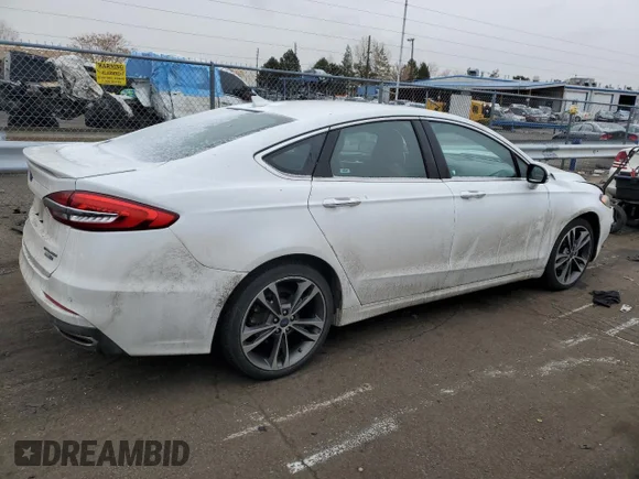 ✅ 2019 Ford Fusion Titanium • VIN: 3FA6P0D9XKR186881 • Lot: 71292632. Wystawiony na Copart z przebiegiem 53 222 mil. Bezpłatny archiwum sprzedaży aukcyjnych z USA i szczegółowy raport historii pojazdu na DreamBid. Zdjęcie 3.