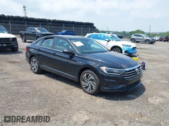 ✅ 2021 Volkswagen Jetta SEL • VIN: 3VWE57BU5MM014332 • Lot: 45372073. Wystawiony na IAAI z przebiegiem 31 858 mil. Bezpłatny archiwum sprzedaży aukcyjnych z USA i szczegółowy raport historii pojazdu na DreamBid. Zdjęcie 1.