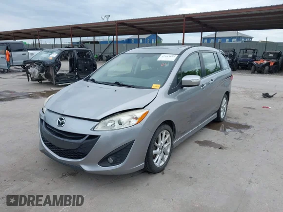 ✅ 2015 Mazda 5 Grand Touring • VIN: JM1CW2DL1F0182084 • Лот: 42643851. Опубліковано раніше на IAAI з пробігом 54 534 миль. Безкоштовний доступ до архіву аукціонних продажів зі США та докладний звіт про історію автомобіля на DreamBid. Зображення 2.