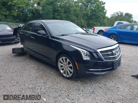 ✅ 2018 Cadillac ATS Luxury AWD • VIN: 1G6AF5RX3J0131718 • Lot: 43036390. Listed on IAAI with 32,670 mi. Free auction sales archive from the USA and detailed vehicle history report at DreamBid. Image 1.