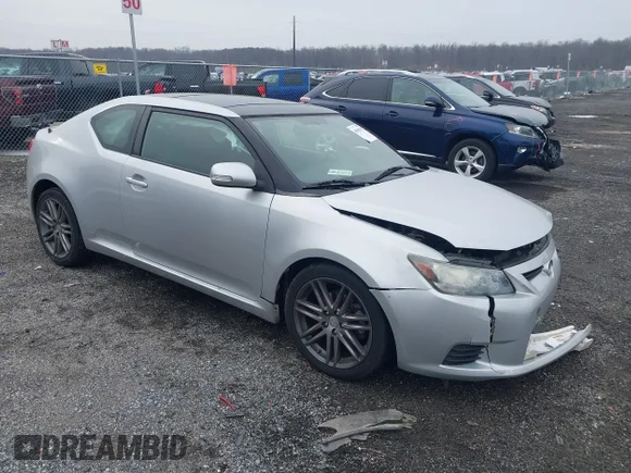 ✅ 2012 Scion tC Release Series 7.0 • VIN: JTKJF5C70C3029163 • Lot: 44086795. Wystawiony na IAAI z przebiegiem 166 687 mil. Bezpłatny archiwum sprzedaży aukcyjnych z USA i szczegółowy raport historii pojazdu na DreamBid. Zdjęcie 1.