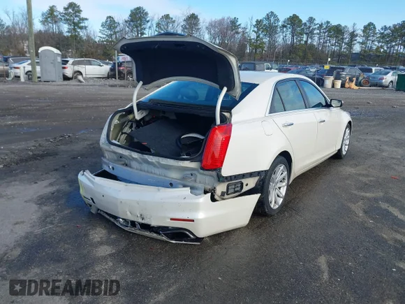 ✅ 2014 Cadillac CTS RWD • VIN: 1G6AP5SX2E0128760 • Лот: 41719528. Опубликован ранее на IAAI с пробегом 101 916 миль. Бесплатный доступ к архиву аукционных продаж из США и подробный отчёт об истории автомобиля на DreamBid. Изображение 4.