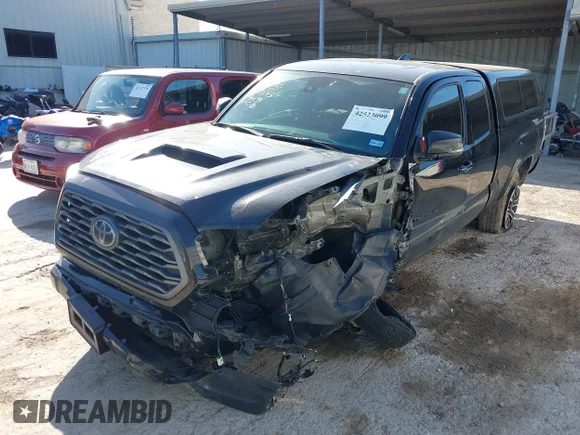 ✅ 2023 Toyota Tacoma SR • VIN: 3TYRZ5CN9PT025699 • Lot: 42523099. Wystawiony na IAAI z przebiegiem 70 384 mil. Bezpłatny archiwum sprzedaży aukcyjnych z USA i szczegółowy raport historii pojazdu na DreamBid. Zdjęcie 2.