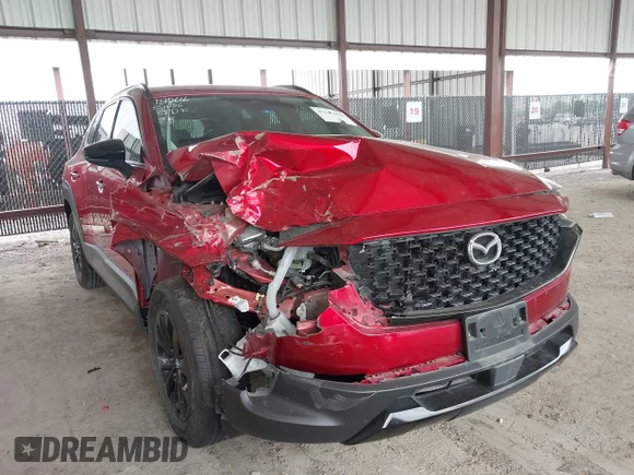 ✅ 2025 Mazda CX-50 Hybrid Premium Package • VIN: 7MMVAADW3SN104642 • Lot: 45147008. Listed on IAAI with 19,779 mi. Free auction sales archive from the USA and detailed vehicle history report at DreamBid. Image 1.