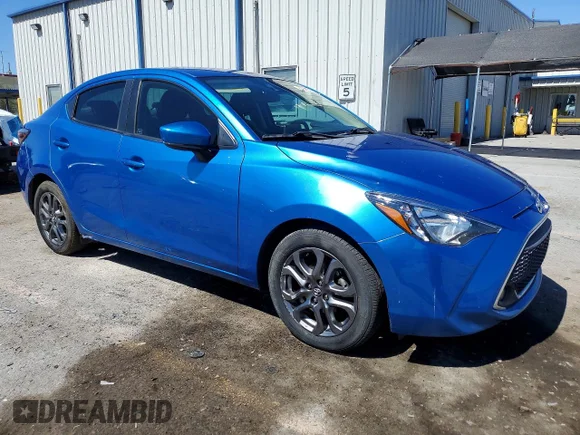 ✅ 2019 Toyota Yaris L • VIN: 3MYDLBYV4KY502525 • Лот: 59329586. Опубліковано раніше на Copart з пробігом 64 390 миль. Безкоштовний доступ до архіву аукціонних продажів зі США та докладний звіт про історію автомобіля на DreamBid. Зображення 4.