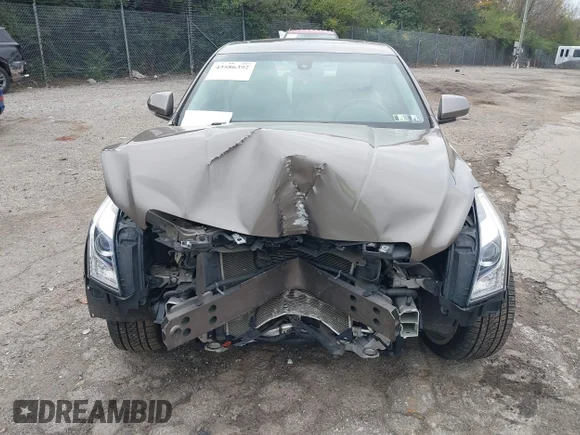 ✅ 2014 Cadillac ATS Luxury AWD • VIN: 1G6AH5RX3E0163939 • Лот: 43586392. Опубліковано раніше на IAAI з пробігом 95 197 миль. Безкоштовний доступ до архіву аукціонних продажів зі США та докладний звіт про історію автомобіля на DreamBid. Зображення 6.