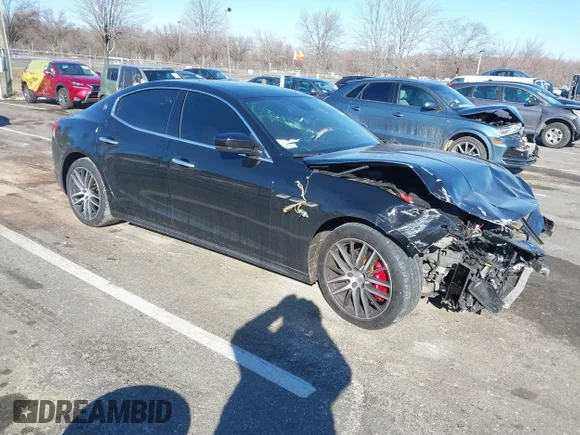 ✅ 2018 Maserati Ghibli • VIN: ZAM57XSA8J1293170 • Lot: 41329004. Listed on IAAI with 69,979 mi. Free auction sales archive from the USA and detailed vehicle history report at DreamBid. Image 1.