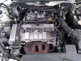 ✅ 2003 Mazda Protege DX • VIN: JM1BJ225931108643 • Lot: 39387591. Listed on IAAI with 180,754 mi. Free auction sales archive from the USA and detailed vehicle history report at DreamBid. Image 12.